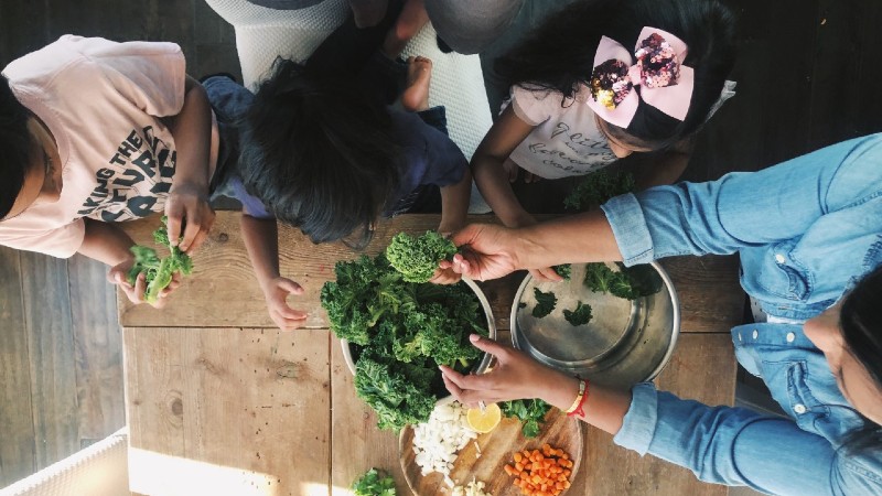 family preparing veggies