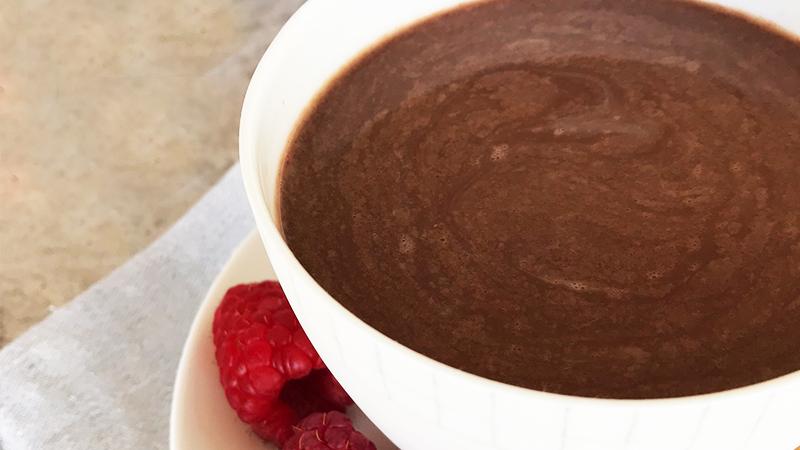 Almond milk hot cocoa, berries, and nuts