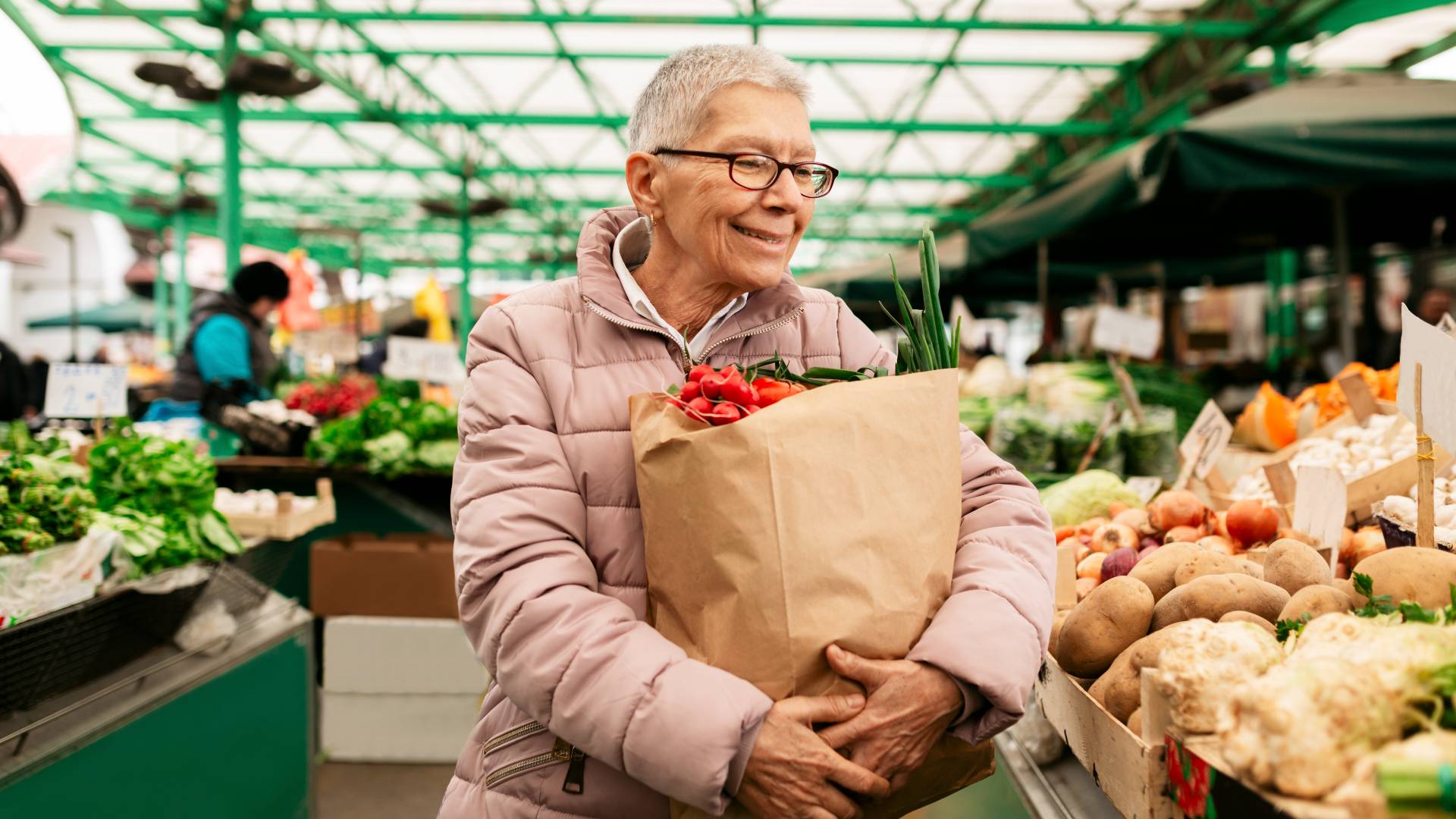 senior shopping for vegetables