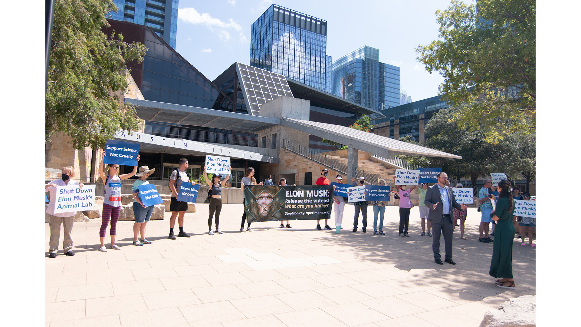 Doctors, Scientists Call Out Elon Musk’s Cruel Animal Experiments With Protest, Giant Bus Ads