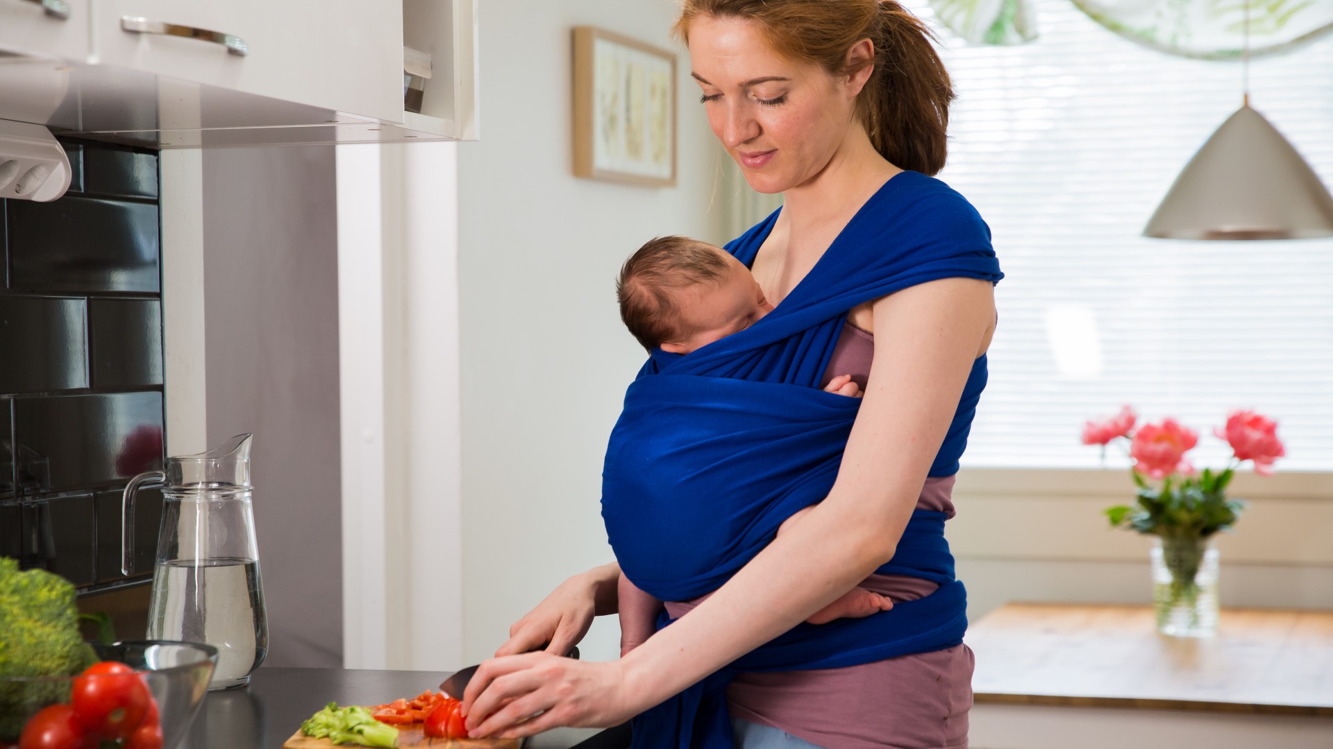 breast feeding and chopping vegetables
