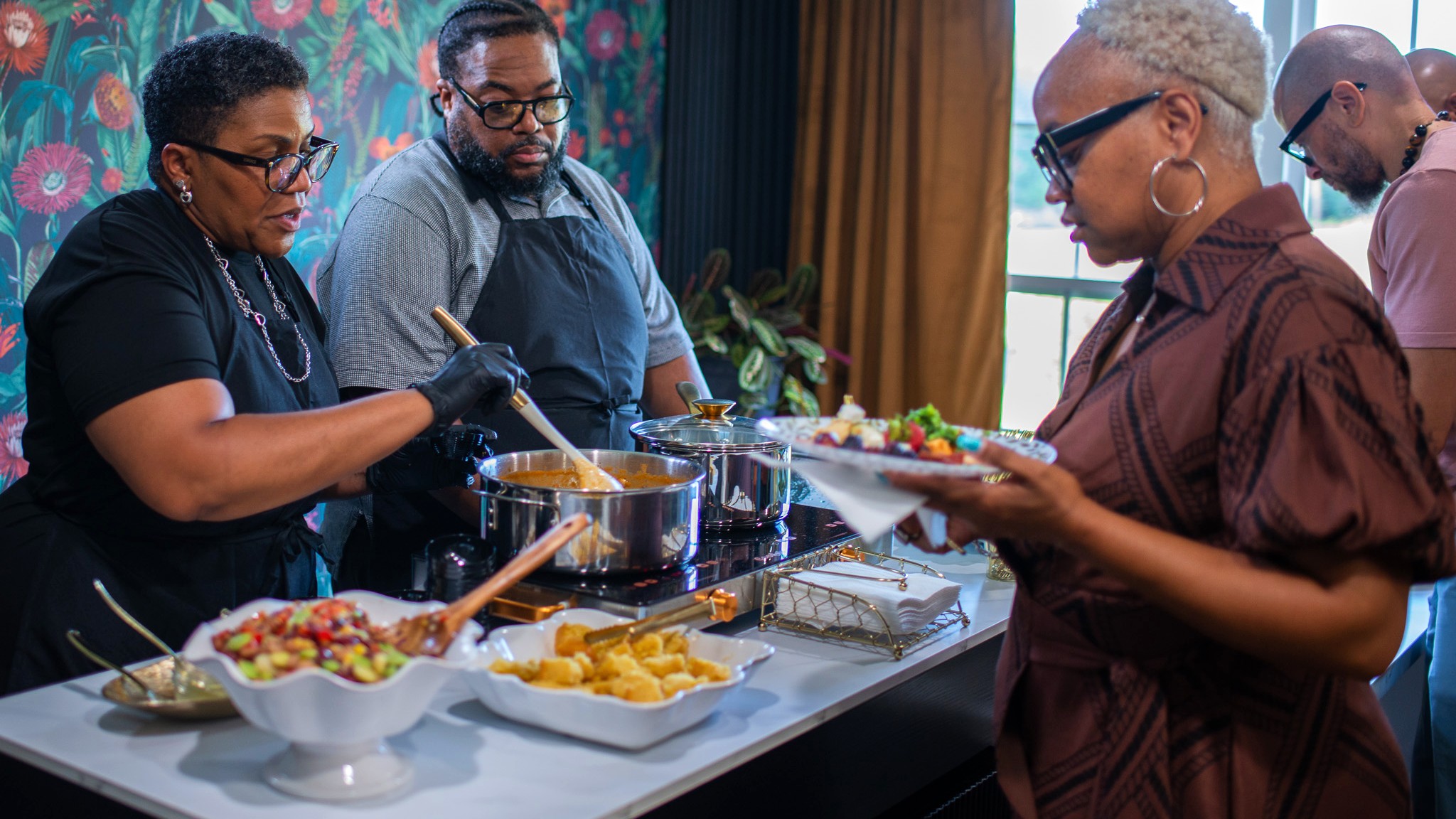 Guests enjoy a cooking demonstration and tastings