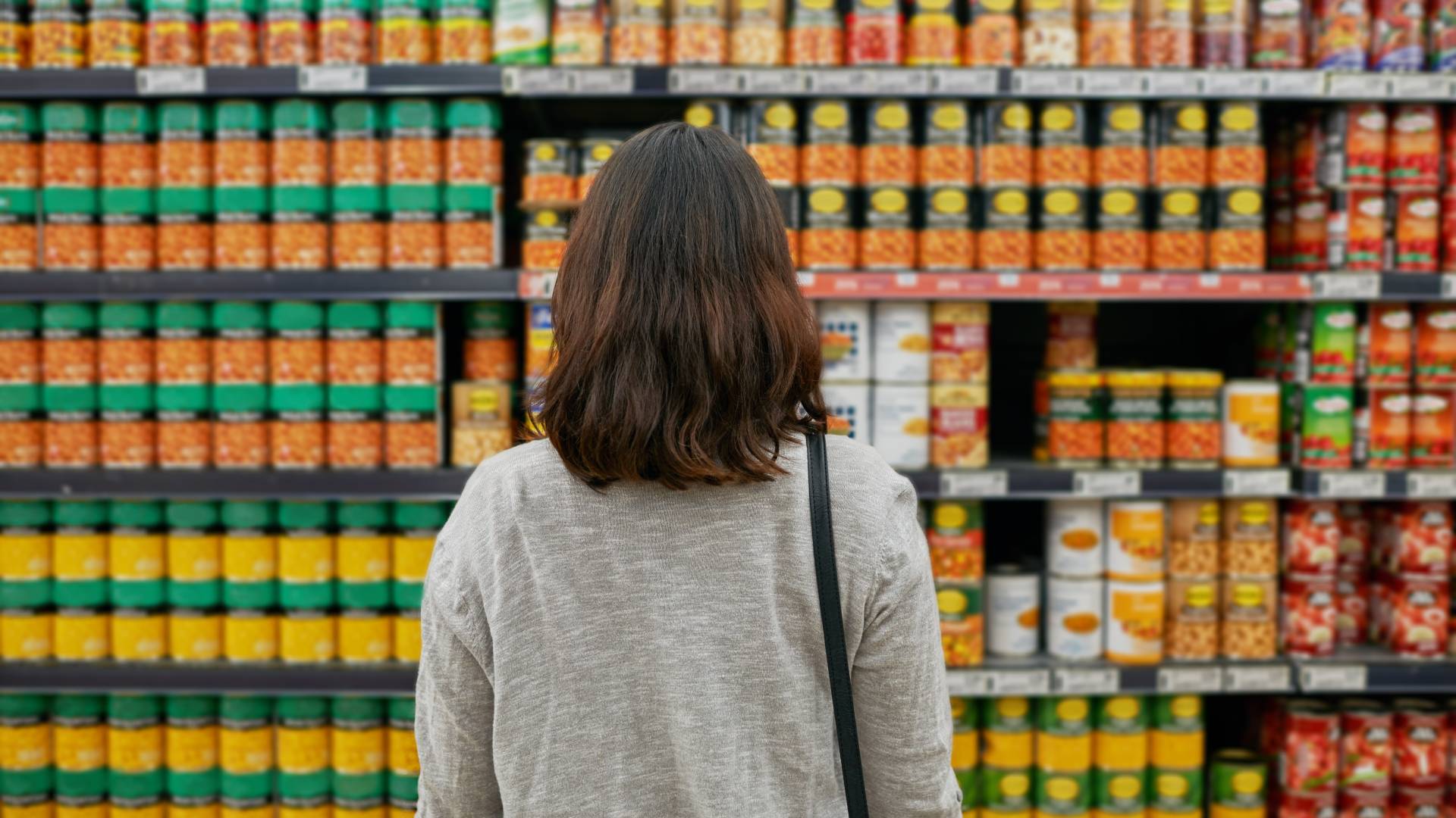 grocery shelf of canned goods