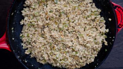 Add remaining 1/2 cup water and tempeh. Sauté for 5 to 7 minutes, allowing the tempeh to get well-done.
