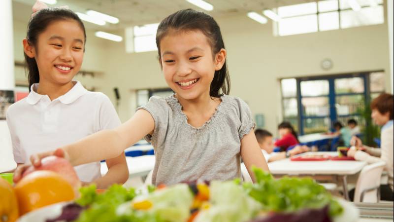 students in school cafeteria